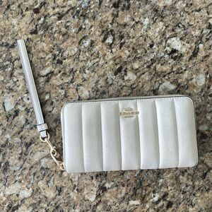 Coach, genuine, leather chalk white long zip around wristlet wallet.